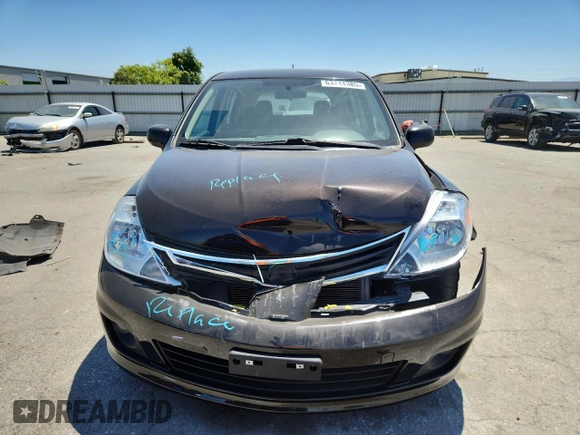 2011 Nissan Versa S with VIN 3N1BC1CP1BL457889, listed as a Copart auction lot 63414385 with 120,303 mi miles and Salvage title. Bid and sale history available at DreamBid. Image 5.