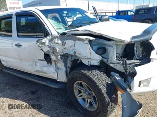2013 Toyota Tacoma PreRunner with VIN 3TMKU4HN8DM038566, listed as a IAAI auction lot 41296386 with 153,240 mi miles and . Bid and sale history available at DreamBid. Image 6.