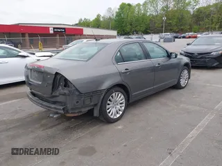 2011 Ford Fusion SE with VIN 3FAHP0HA1BR203046, listed as a IAAI auction lot 42011121 with 302,078 mi miles. Bid and sale history available at carsss.com. Image 4.
