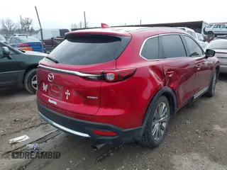 2021 Mazda CX-9 Signature with VIN JM3TCBEY0M0502938, listed as a IAAI auction lot 41734208 with 59,375 mi miles and . Bid and sale history available at carsss.com. Image 4.