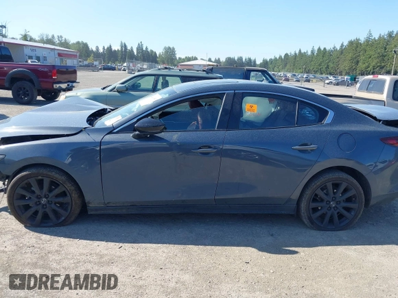 2023 Mazda 3 S Carbon Edition with VIN 3MZBPACM5PM376545, listed as a IAAI auction lot 42404054 with Not provided miles and . Bid and sale history available at DreamBid. Image 14.