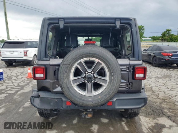 2018 Jeep Wrangler Unlimited Sahara z VIN 1C4HJXEG8JW112042, wystawiony jako Copart lot #55596745 z przebiegiem 75 096 mil mil oraz Szkoda całkowita • Salvage title. Historia ofert i sprzedaży dostępna na DreamBid. Obrazek 6.