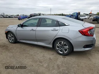 2017 Honda Civic LX z VIN 2HGFC2F51HH011825, wystawiony jako Copart lot #56276965 z przebiegiem 136 266 mil mil oraz Szkoda całkowita • Salvage title. Historia ofert i sprzedaży dostępna na DreamBid. Obrazek 2.