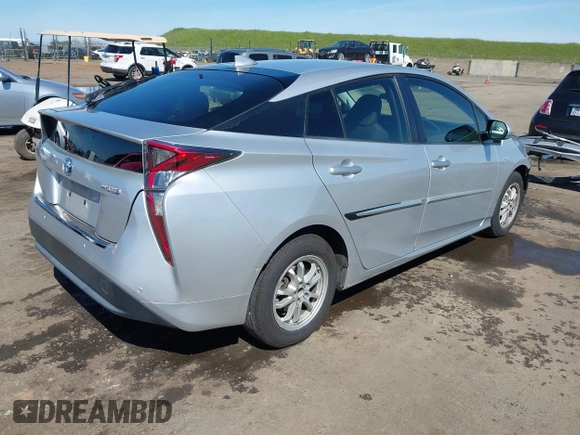 2018 Toyota Prius Two with VIN JTDKARFU6J3554096, listed as a IAAI auction lot 41856090 with 129,873 mi miles. Bid and sale history available at carsss.com. Image 4.