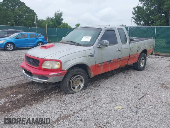 1997 Ford F-150 XL with VIN 1FTDX1869VNA33231, listed as a IAAI auction lot 42697823 with 149,986 mi miles and . Bid and sale history available at DreamBid. Image 2.