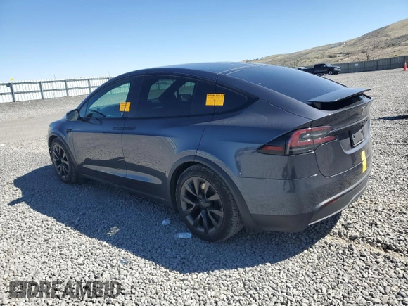 2023 Tesla Model X with VIN 7SAXCAE52PF380229, listed as a Copart auction lot 53535065 with 42,456 mi miles and Salvage Title. Bid and sale history available at DreamBid. Image 2.