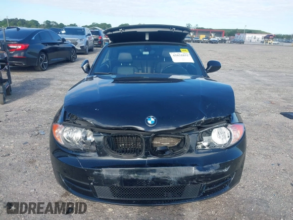 2011 BMW 1 Series 128i with VIN WBAUL7C54BVM80474, listed as a IAAI auction lot 42031032 with 76,617 mi miles and . Bid and sale history available at carsss.com. Image 12.