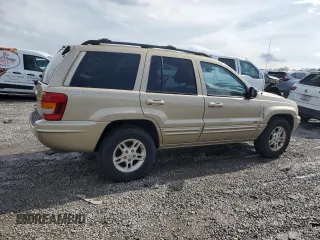 2000 Jeep Grand Cherokee Limited with VIN 1J4GW58N7YC327607, listed as a Copart auction lot 54711615 with 108,241 mi miles and Salvage title. Bid and sale history available at DreamBid. Image 3.