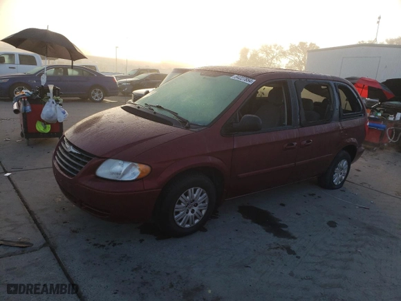 2007 Chrysler Town & Country SWB with VIN 1A4GJ45R27B113449, listed as a Copart auction lot 84227854 with 90,865 mi miles and Salvage Title. Bid and sale history available at carsss.com. Image 1.