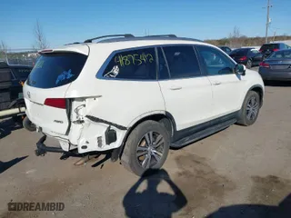 2016 Honda Pilot EX-L with VIN 5FNYF6H52GB029080, listed as a IAAI auction lot 41875412 with 127,697 mi miles. Bid and sale history available at carsss.com. Image 4.