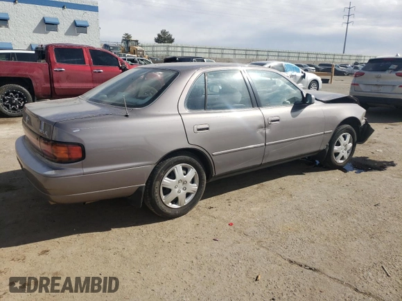 1994 Toyota Camry LE z VIN JT2GK12E2R0050878, wystawiony jako Copart lot #46878005 z przebiegiem 152 211 mil mil oraz Szkoda całkowita • Salvage title. Historia ofert i sprzedaży dostępna na DreamBid. Obrazek 3.