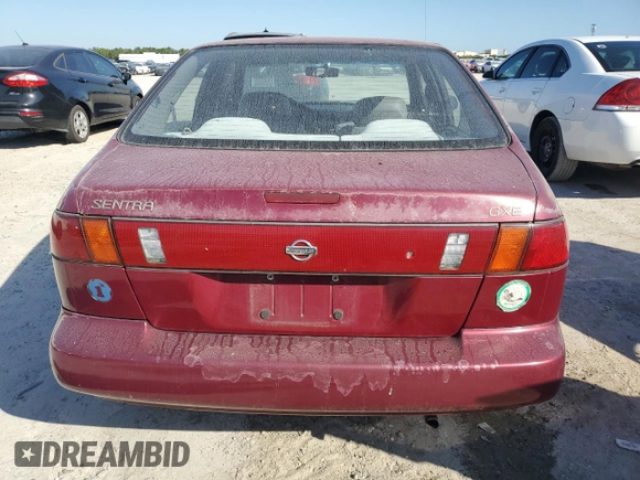 1996 Nissan Sentra XE z VIN 3N1AB41D3TL027288, wystawiony jako Copart lot #77255804 z przebiegiem 132 033 mil mil oraz Czysty tytuł • Clean title. Historia ofert i sprzedaży dostępna na DreamBid. Obrazek 6.