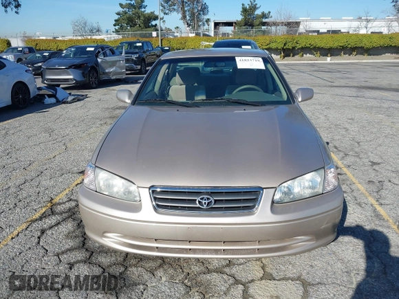 2001 Toyota Camry CE with VIN JT2BG22KX10559757, listed as a IAAI auction lot 41823719 with 72,775 mi miles. Bid and sale history available at carsss.com. Image 12.