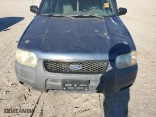 2001 Ford Escape XLT with VIN 1FMYU03171KB12159, listed as a Copart auction lot 87974165 with 0 mi miles and Salvage Title. Bid and sale history available at carsss.com. Image 12.