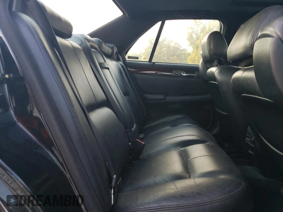 2001 Cadillac Seville Touring STS z VIN 1G6KY549X1U282930, wystawiony jako Copart lot #72750504 z przebiegiem Nie podano mil oraz Szkoda całkowita • Salvage title. Historia ofert i sprzedaży dostępna na DreamBid. Obrazek 10.