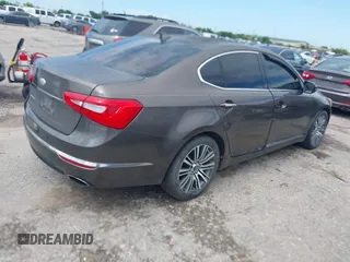 2014 Kia Cadenza Premium z VIN KNALN4D74E5144896, wystawiony jako IAAI lot #42466220 z przebiegiem 157 654 mil mil oraz . Historia ofert i sprzedaży dostępna na DreamBid. Obrazek 4.