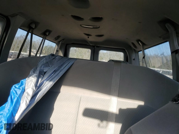2011 Ford Econoline Passenger XL with VIN 1FBNE3BLXBDA42711, listed as a Copart auction lot 44326425 with 476,137 mi miles and Salvage Title. Bid and sale history available at carsss.com. Image 10.