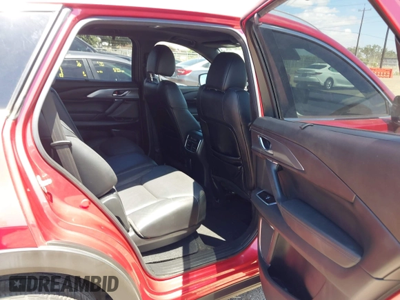 2017 Mazda CX-9 Grand Touring z VIN JM3TCADY3H0140895, wystawiony jako IAAI lot #42817948 z przebiegiem 125 288 mil mil oraz . Historia ofert i sprzedaży dostępna na DreamBid. Obrazek 8.