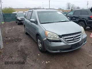2006 Honda Odyssey EX z VIN 5FNRL38476B129600, wystawiony jako IAAI lot #41901637 z przebiegiem 245 896 mil mil oraz . Historia ofert i sprzedaży dostępna na DreamBid. Obrazek 1.