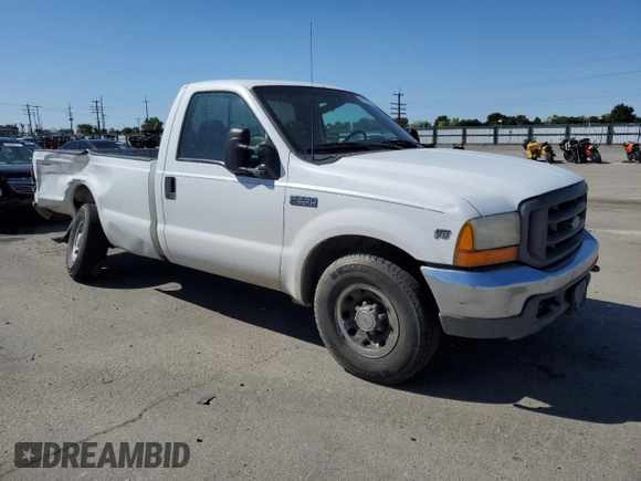 1999 Ford Super Duty F-250 XL with VIN 1FTNF20LXXED61260, listed as a Copart auction lot 59962984 with 396,049 mi miles and Salvage Title. Bid and sale history available at carsss.com. Image 4.