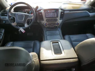 2019 GMC Yukon Denali with VIN 1GKS1CKJ9KR134571, listed as a Copart auction lot 73275664 with 50,853 mi miles and Salvage Title. Bid and sale history available at carsss.com. Image 8.