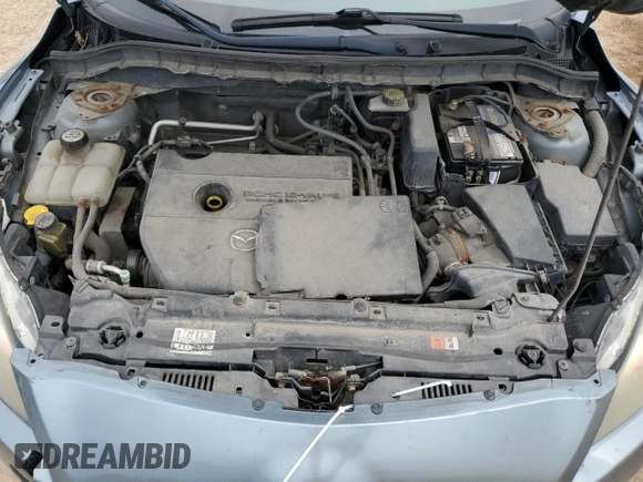 2012 Mazda 3 i Sport z VIN JM1BL1UF2C1504181, wystawiony jako Copart lot #56019085 z przebiegiem 181 946 mil mil oraz Szkoda całkowita • Salvage title. Historia ofert i sprzedaży dostępna na DreamBid. Obrazek 11.