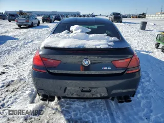 2013 BMW M6 z VIN WBSLX9C52DC968845, wystawiony jako Copart lot #44187305 z przebiegiem Nie podano mil oraz Czysty tytuł • Clean title. Historia ofert i sprzedaży dostępna na DreamBid. Obrazek 6.