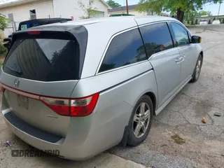 2012 Honda Odyssey Touring with VIN 5FNRL5H95CB101605, listed as a IAAI auction lot 42025163 with 286,421 mi miles. Bid and sale history available at carsss.com. Image 4.