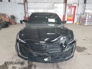 2021 Cadillac CT5 Luxury z VIN 1G6DX5RK0M0147667, wystawiony jako IAAI lot #41398726 z przebiegiem 50 387 mil mil oraz . Historia ofert i sprzedaży dostępna na DreamBid. Obrazek 12.