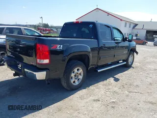 2012 GMC Sierra 1500 SLT with VIN 3GTP2WE70CG134587, listed as a IAAI auction lot 41973632 with 206,378 mi miles and . Bid and sale history available at DreamBid. Image 4.