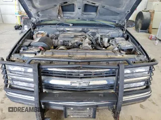 1999 Chevrolet Suburban with VIN 1GNGK26J6XJ444189, listed as a Copart auction lot 68249474 with 216,412 mi miles and Salvage Title. Bid and sale history available at carsss.com. Image 13.
