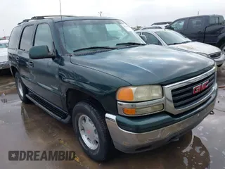 2002 GMC Yukon SLT with VIN 1GKEC13Z52R174419, listed as a IAAI auction lot 41724923 with 309,700 mi miles. Bid and sale history available at carsss.com. Image 1.