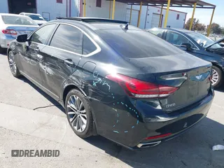 2016 Hyundai Genesis 3.8L z VIN KMHGN4JE3GU131049, wystawiony jako IAAI lot #42022155 z przebiegiem 107 801 mil mil oraz . Historia ofert i sprzedaży dostępna na DreamBid. Obrazek 3.