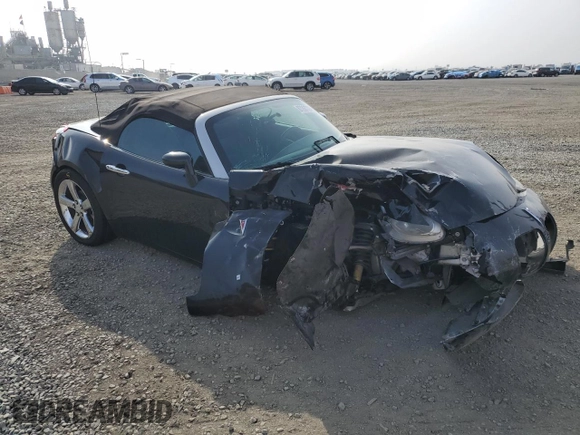 2007 Pontiac Solstice z VIN 1G2MB35B97Y117728, wystawiony jako Copart lot #87267724 z przebiegiem Nie podano mil oraz Szkoda całkowita • Salvage title. Historia ofert i sprzedaży dostępna na DreamBid. Obrazek 4.