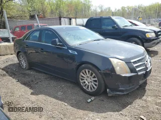 2010 Cadillac CTS with VIN 1G6DA5EG6A0128538, listed as a Copart auction lot 53659435 with 206,271 mi miles and Salvage Title. Bid and sale history available at DreamBid. Image 4.