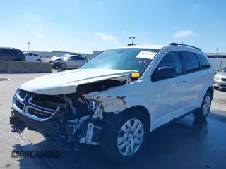 2019 Dodge Journey SE Value with VIN 3C4PDCAB1KT868065, listed as a IAAI auction lot 41642318 with 97,735 mi miles and . Bid and sale history available at DreamBid. Image 20.