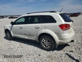 2015 Dodge Journey SXT with VIN 3C4PDDBG5FT544140, listed as a Copart auction lot 52827985 with 153,224 mi miles and Salvage Title. Bid and sale history available at DreamBid. Image 1.