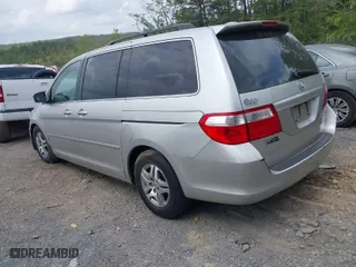 2005 Honda Odyssey EX-L with VIN 5FNRL38785B000287, listed as a IAAI auction lot 42093706 with 214,645 mi miles. Bid and sale history available at carsss.com. Image 3.