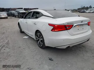 2018 Nissan Maxima SL with VIN 1N4AA6AP7JC371792, listed as a IAAI auction lot 41285671 with 137,517 mi miles. Bid and sale history available at carsss.com. Image 3.