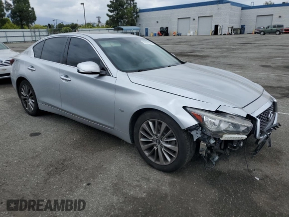 2019 Infiniti Q50 Luxe with VIN JN1EV7AP5KM519698, listed as a Copart auction lot 53374145 with 80,202 mi miles and Salvage title. Bid and sale history available at DreamBid. Image 4.