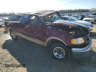 1999 Ford F-150 XL z VIN 1FTRX17L3XNB57415, wystawiony jako Copart lot #88307245 z przebiegiem Nie podano mil oraz Nie do naprawy • Non repairable. Historia ofert i sprzedaży dostępna na DreamBid. Obrazek 4.