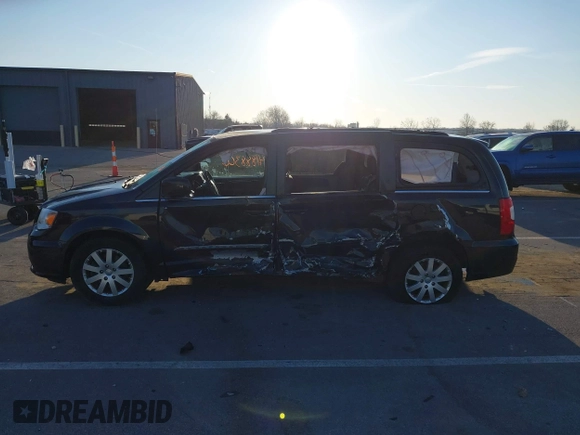 2014 Chrysler Town & Country Touring with VIN 2C4RC1BGXER124367, listed as a IAAI auction lot 41888366 with 143,638 mi miles and . Bid and sale history available at DreamBid. Image 14.