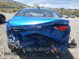 2021 Nissan Versa SV z VIN 3N1CN8EV6ML865567, wystawiony jako Copart lot #56343195 z przebiegiem Nie podano mil oraz Szkody całkowita. Historia ofert i sprzedaży dostępna na DreamBid. Obrazek 6.