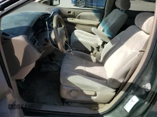 1999 Toyota Sienna LE with VIN 4T3ZF13C9XU097657, listed as a Copart auction lot 79008884 with 361,011 mi miles and Salvage Title. Bid and sale history available at carsss.com. Image 7.