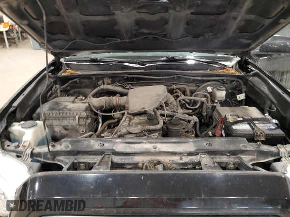 2018 Toyota Tacoma SR z VIN 5TFSX5EN3JX061440, wystawiony jako Copart lot #86986654 z przebiegiem 172 754 mil mil oraz Szkoda całkowita • Salvage title. Historia ofert i sprzedaży dostępna na DreamBid. Obrazek 11.