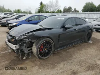 2018 Porsche Panamera 4S с VIN WP0AB2A79JL199068, выставлен на аукционе Copart как лот 60133525 с пробегом 72 003 миль миль и Списание • Salvage title. История ставок и продаж доступна на DreamBid. Изображение 1.