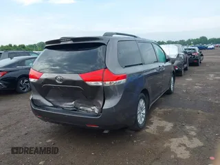 2014 Toyota Sienna XLE with VIN 5TDYK3DC0ES496716, listed as a IAAI auction lot 42494549 with 158,645 mi miles and . Bid and sale history available at DreamBid. Image 16.