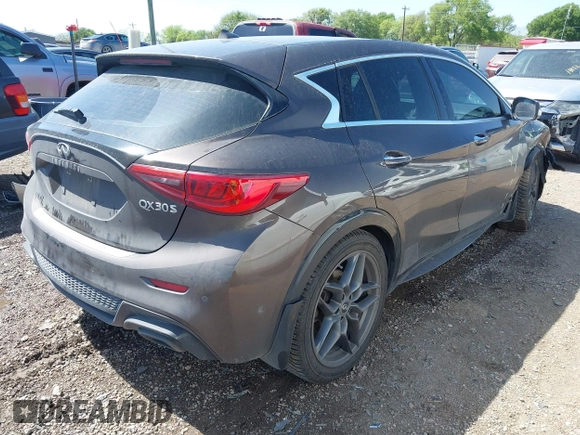 2017 Infiniti QX30 Sport with VIN SJKCH5CP3HA023156, listed as a IAAI auction lot 41870773 with 51,063 mi miles. Bid and sale history available at carsss.com. Image 4.