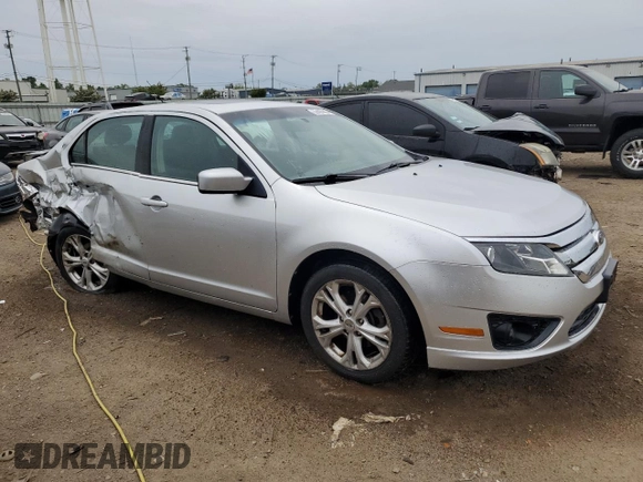 2012 Ford Fusion SE with VIN 3FAHP0HA6CR104918, listed as a Copart auction lot 57497295 with 177,017 mi miles and Salvage title. Bid and sale history available at DreamBid. Image 4.
