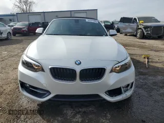 2016 BMW 2 Series 228i with VIN WBA1K9C52GV321798, listed as a Copart auction lot 45011725 with 56,673 mi miles and Salvage Title. Bid and sale history available at carsss.com. Image 5.